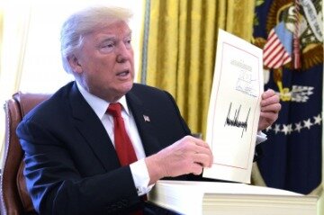 president signs tax bill